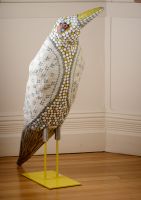 Bird with knitted jacket