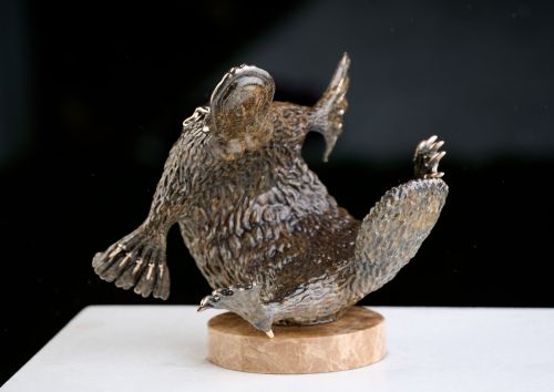 Playing platypuses sculpture by Jake Mikoda