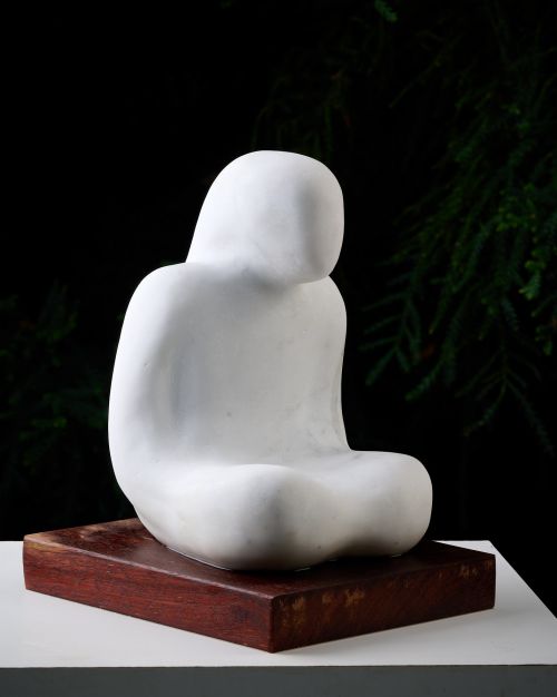 Seated figure sculpture by Peter Sanders