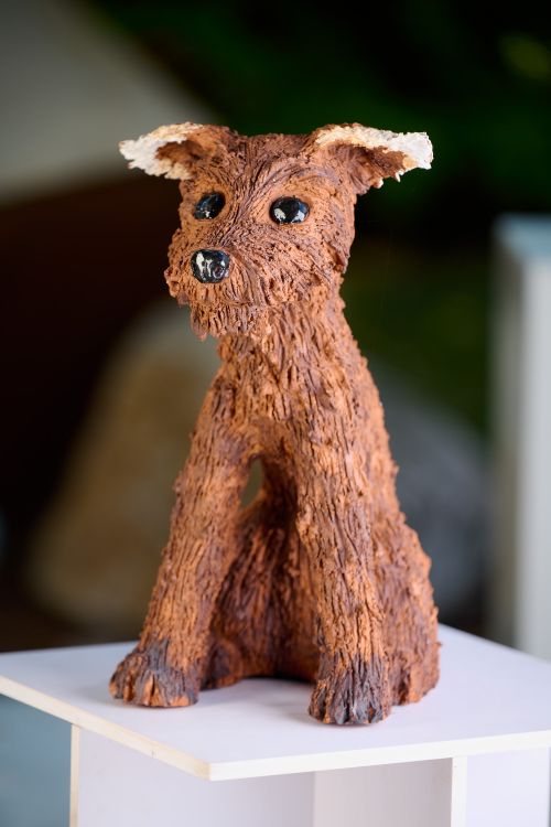 Brown dog sculpture by Heather Wilson