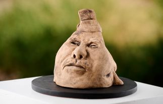 MORE THAN TWO FACED. -&nbsp; Sculpture one